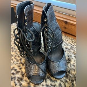 Black lace up high ankle heels, worn one time